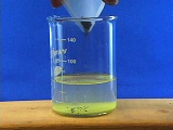 WO3, funnel over 250mL beaker with clear/yellowish liquid 1/3 full