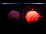 Fluoresce, small circles, on left not glowing, on right glowing red