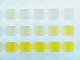 micelle series, 12 small cubes of clear to light yellow substances