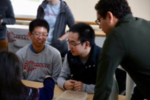 Volunteers explain science at engineering expo