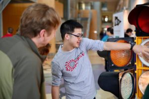 Volunteers explain science at engineering expo