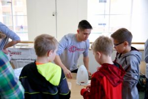 Volunteers explain science at engineering expo