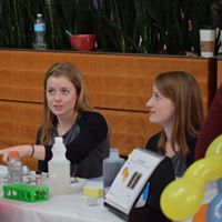 Volunteers interact with visitors