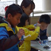 Volunteers interact with visitors