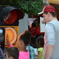 Volunteers interact with visitors
