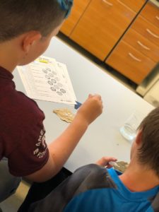 Local students perform a MRSEC field trip experiment