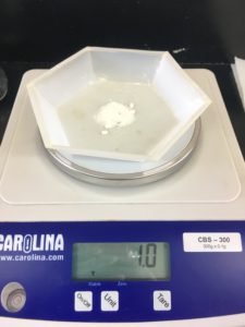 An RET participant performs an experiment