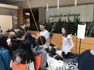 Wisconsin Science Festival Volunteers explaining science