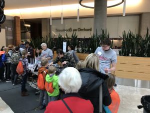 Wisconsin Science Festival Volunteers explaining science