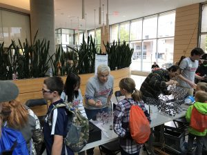 Wisconsin Science Festival Volunteers explaining science
