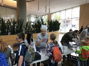 Wisconsin Science Festival Volunteers explaining science