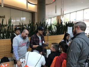Wisconsin Science Festival Volunteers explaining science