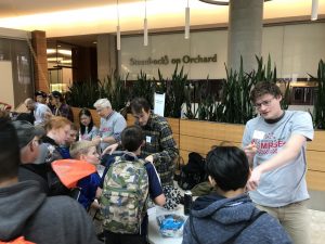Wisconsin Science Festival Volunteers explaining science
