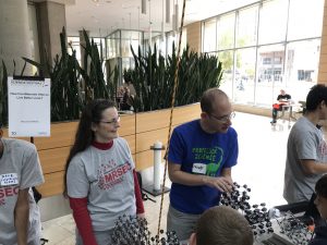 Wisconsin Science Festival Volunteers explaining science