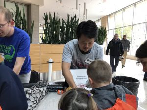 Wisconsin Science Festival Volunteers explaining science