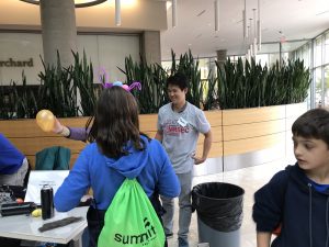 Wisconsin Science Festival Volunteers explaining science