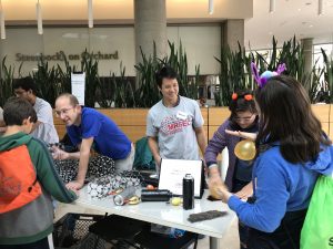 Wisconsin Science Festival Volunteers explaining science