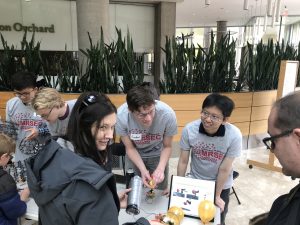 Wisconsin Science Festival Volunteers explaining science