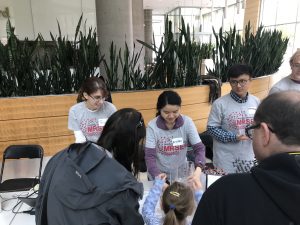 Wisconsin Science Festival Volunteers explaining science
