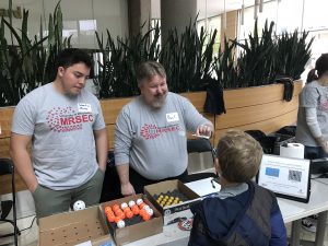 Wisconsin Science Festival Volunteers explaining science