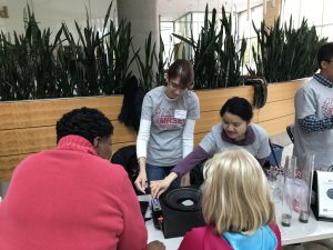 Wisconsin Science Festival Volunteers explaining science