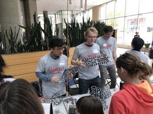 Wisconsin Science Festival Volunteers explaining science