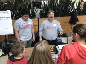 Wisconsin Science Festival Volunteers explaining science