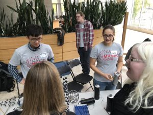 Wisconsin Science Festival Volunteers explaining science