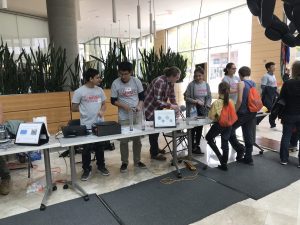 Wisconsin Science Festival Volunteers explaining science
