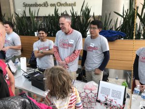Wisconsin Science Festival Volunteers explaining science