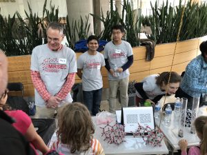 Wisconsin Science Festival Volunteers explaining science
