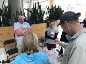 Wisconsin Science Festival Volunteers explaining science