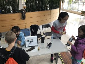 Wisconsin Science Festival Volunteers explaining science