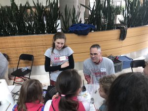 Wisconsin Science Festival Volunteers explaining science