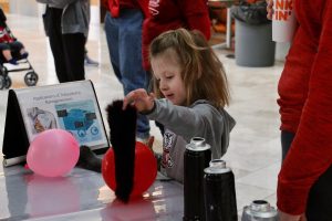 A visitor enjoys our demos
