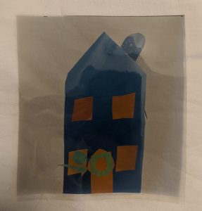 Cellophane layered to create a house when viewed through polarizers